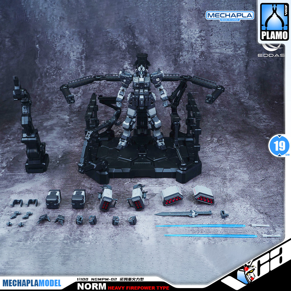 Eddas 伊达斯科技 Norm - Heavy Firepower Type 诺姆重火力型 Metal Build GM Action Figure Model Toy Kit VCA Gundam Singapore A detailed model kit display featuring a gray and black mecha robot on a black display stand, with multiple interchangeable parts, accessories, and weapons arranged around it on a textured gray surface. Brand logos for Mechapla Model, Plamo, and Ecdae are visible in the corners.