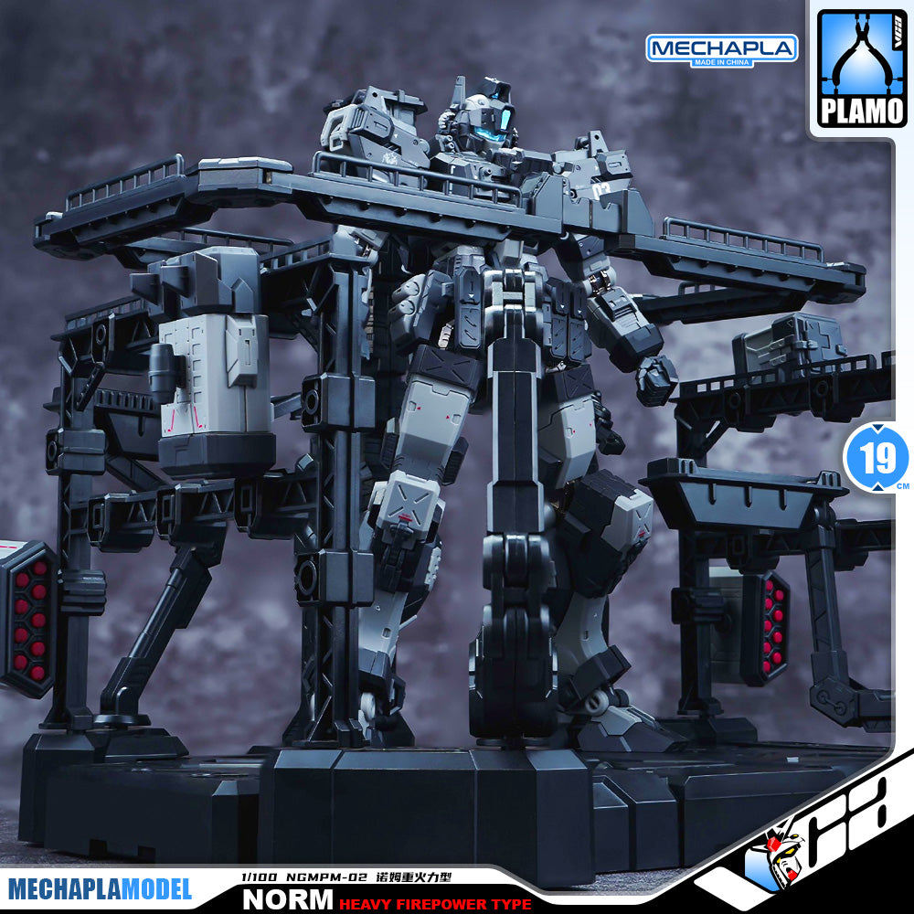 Eddas 伊达斯科技 Norm - Heavy Firepower Type 诺姆重火力型 Metal Build GM Action Figure Model Toy Kit VCA Gundam Singapore A boxed/model kit style product image showing a large gray and black mecha robot standing on a display base, with Mechapla Model branding, Plamo branding, and product text including 'Norm Heavy Firepower Type' and '19'.