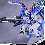 V-Tiger 威虎牛战士 RX-93-v2 Hi-Nu Master Grade MG Metal Build Structure Model Action Figure Kit VCA Gundam Singapore A blue and white MechaPlamo Hi-Nu Gundam model kit shown in a dynamic pose with a large rifle, set against a smoky gray studio background. Brand logos for MechaPlamo and MechaPlamodel are visible in the corners.
