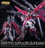 Box art for a Gundam model kit featuring the Destiny Impulse Gundam in a dynamic pose against a starry space background. The main Gundam is pink, white, and blue with large wing-like arms and a rifle, while a smaller version stands to the left holding a blue sword.